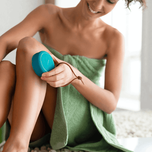 FOREO LUNA™ 4 body Massaging Body Brush being used to massage away dirt and dead skin cells.
